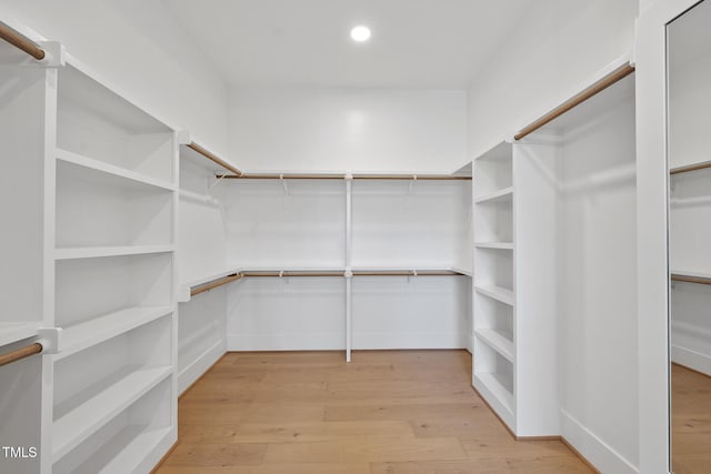 walk in closet featuring light wood-type flooring