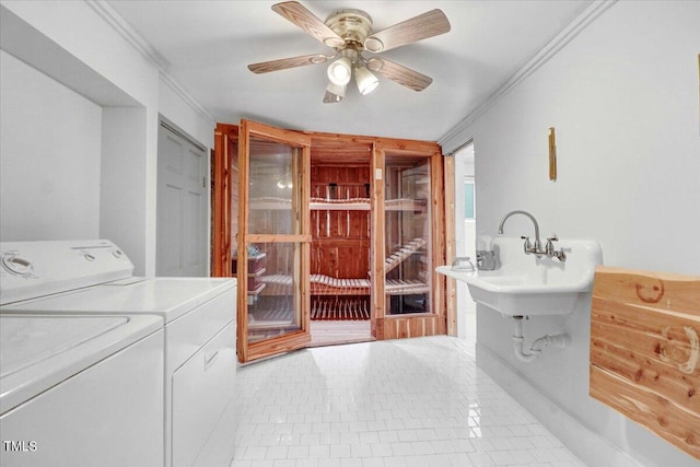 washroom featuring ceiling fan, light tile patterned floors, ornamental molding, and washing machine and dryer