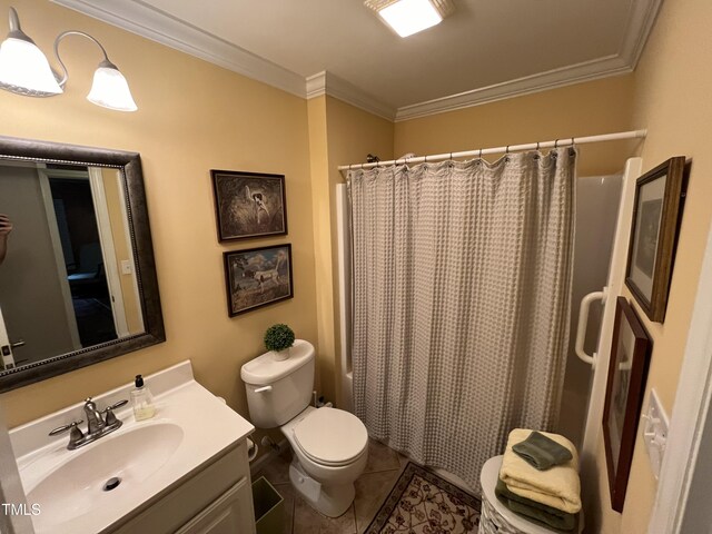 bathroom with crown molding, toilet, tile patterned flooring, and vanity