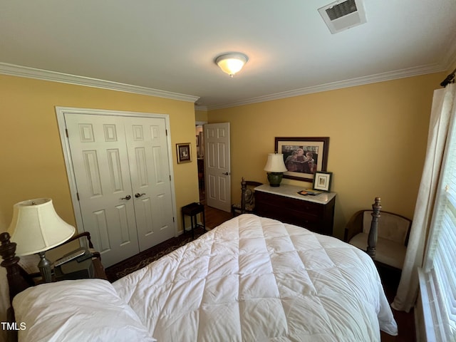 bedroom with a closet and ornamental molding