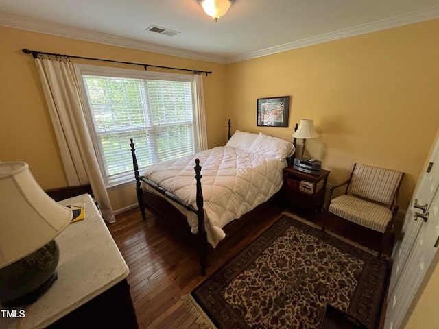 bedroom featuring wood-type flooring and ornamental molding