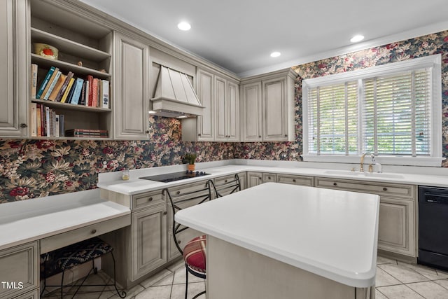 kitchen featuring a center island, custom exhaust hood, light countertops, a sink, and black appliances