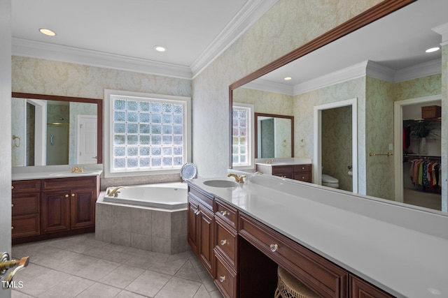 bathroom with ornamental molding and wallpapered walls