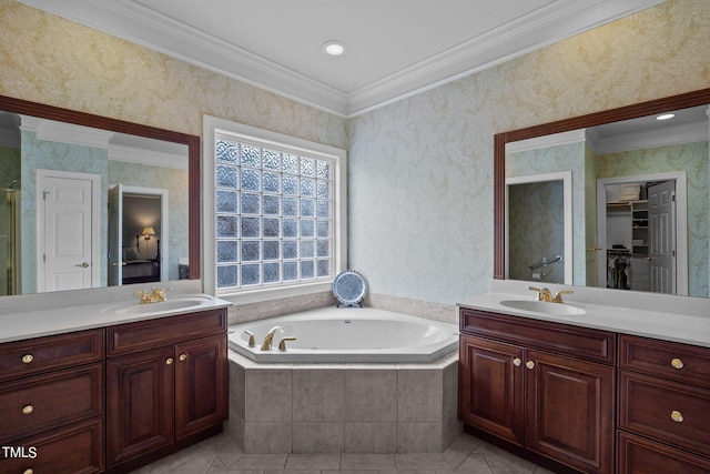 bathroom with two vanities, a sink, and wallpapered walls