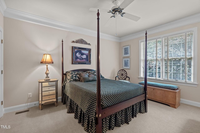 bedroom featuring baseboards, visible vents, crown molding, and light colored carpet