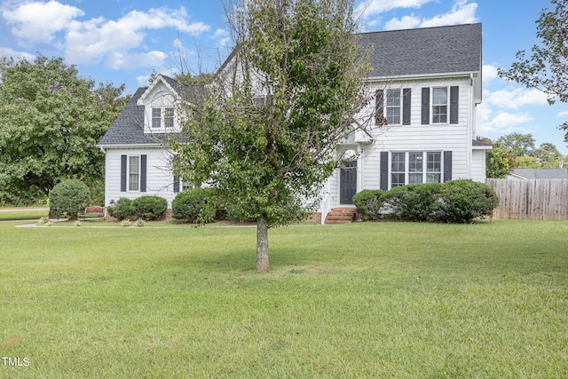 view of front of home featuring a front yard