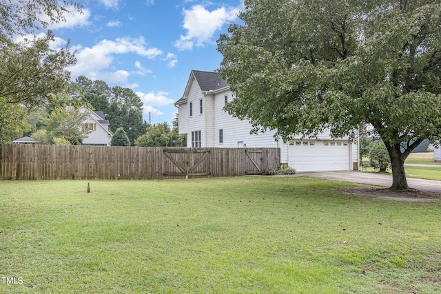 view of yard featuring a garage