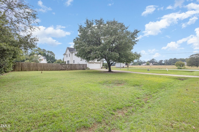 view of yard with a garage