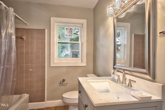 full bathroom with shower / bathtub combination with curtain, vanity, toilet, and a wealth of natural light