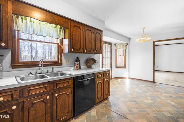 kitchen with dishwasher, hanging light fixtures, a notable chandelier, sink, and dark brown cabinets