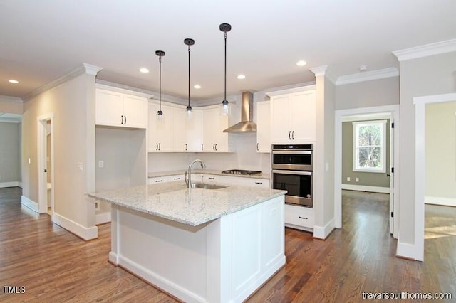 kitchen with dark hardwood / wood-style floors, light stone countertops, white cabinets, an island with sink, and double oven