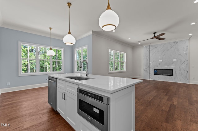 100 N Ridge View Way, Franklinton, NC 27525 - kitchen featuring a sink, a ceiling fan, ornamental molding, dark wood-style floors, and white cabinetry