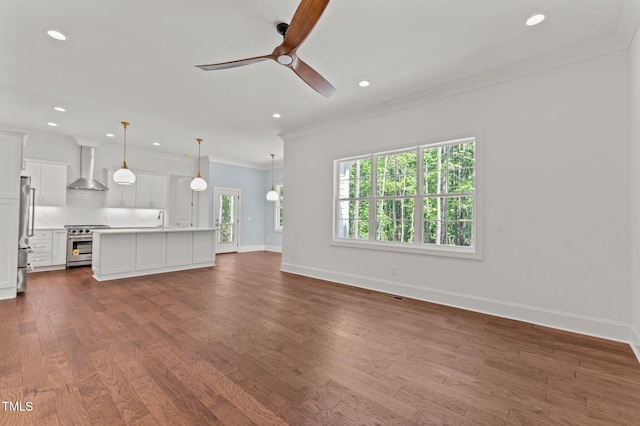 100 N Ridge View Way, Franklinton, NC 27525 - unfurnished living room featuring crown molding, a ceiling fan, plenty of natural light, baseboards, and recessed lighting