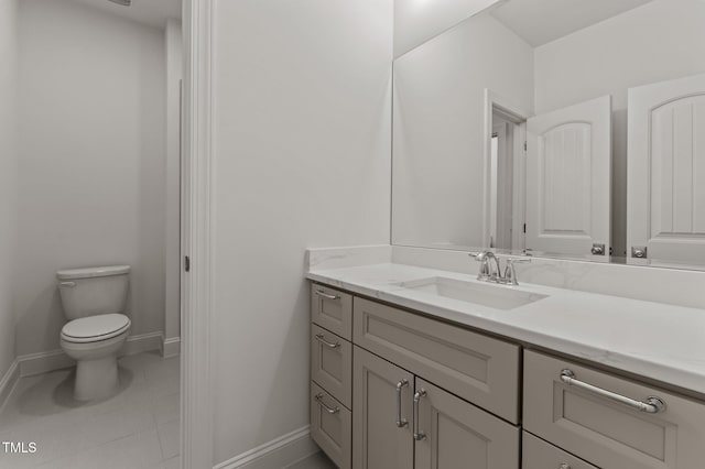 100 N Ridge View Way, Franklinton, NC 27525 - bathroom with baseboards, vanity, toilet, and tile patterned floors