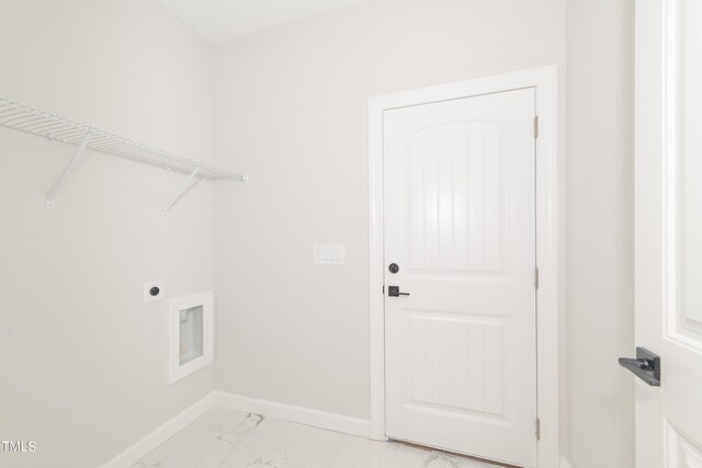 washroom featuring light tile patterned flooring, hookup for a washing machine, and hookup for an electric dryer