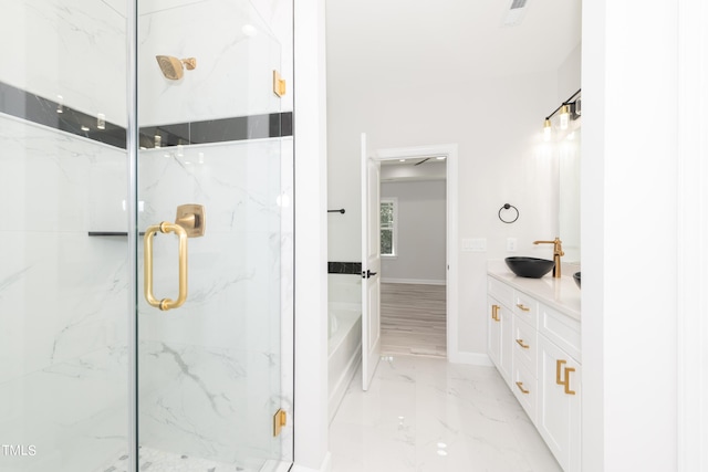 bathroom featuring a shower with door, vanity, and wood-type flooring