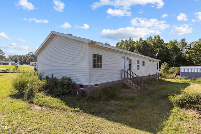 exterior space with a yard