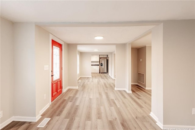 hall featuring light hardwood / wood-style floors