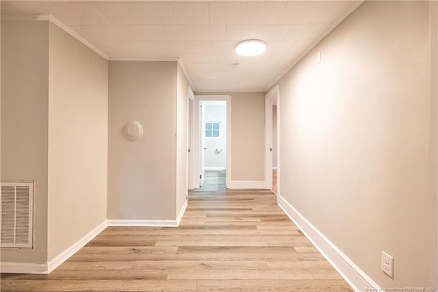 hall with light hardwood / wood-style floors