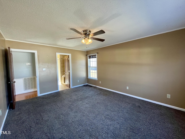 unfurnished bedroom featuring crown molding, ceiling fan, dark carpet, and a textured ceiling