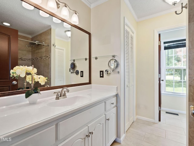 full bath with a textured ceiling, visible vents, a closet, and ornamental molding