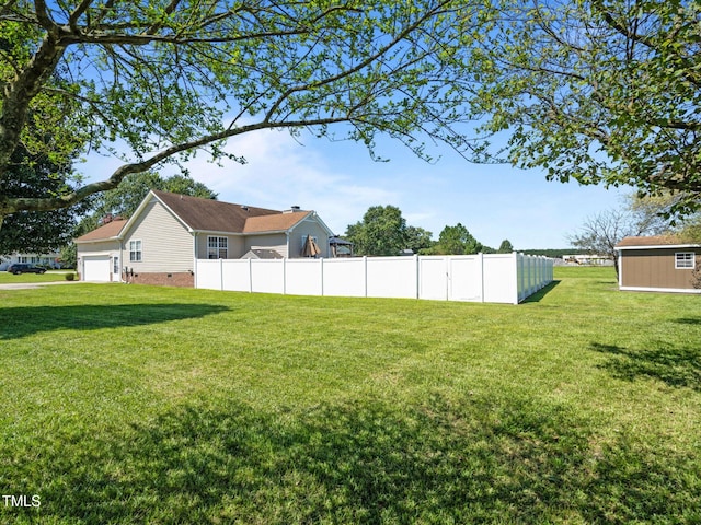 view of yard with fence