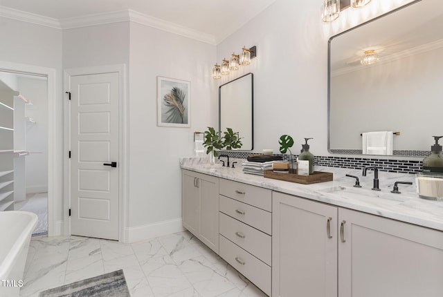 600 Darian Woods Dr, Holly Springs, NC 27540 - bathroom with double vanity, a freestanding tub, marble finish flooring, and crown molding