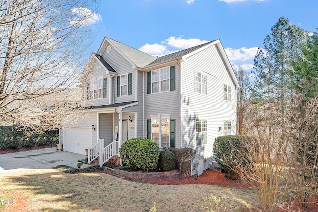 view of front of home featuring a garage and driveway