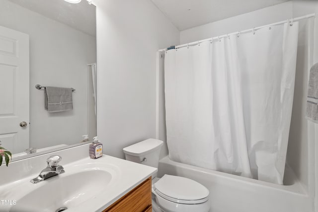 full bath featuring toilet, shower / tub combo with curtain, and vanity