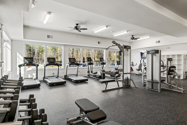 exercise room with ceiling fan