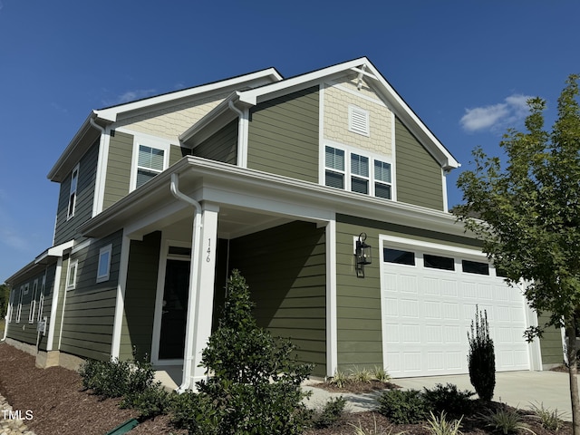 view of side of home with an attached garage