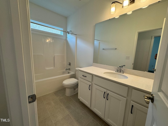 full bathroom featuring bathing tub / shower combination, tile patterned floors, toilet, and vanity