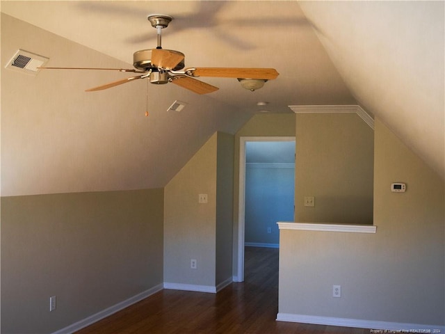 additional living space with ceiling fan, dark hardwood / wood-style floors, and lofted ceiling