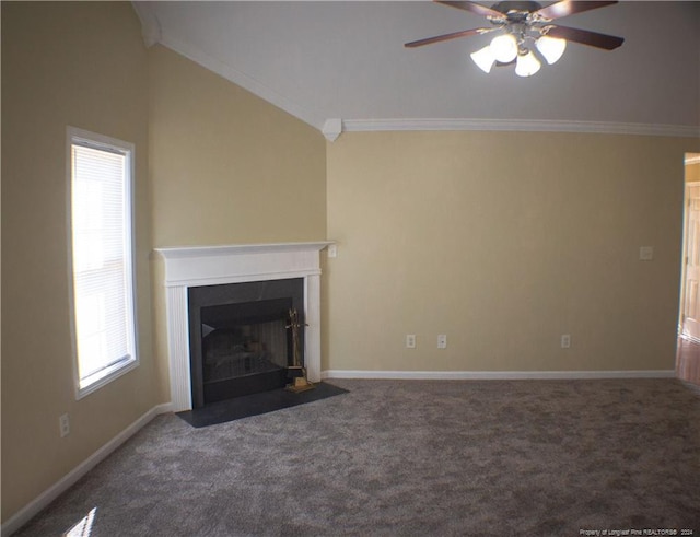 unfurnished living room featuring carpet flooring, plenty of natural light, and vaulted ceiling