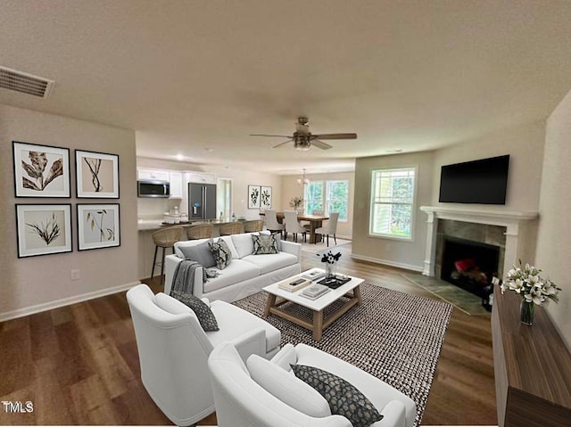 living room with dark hardwood / wood-style floors and ceiling fan