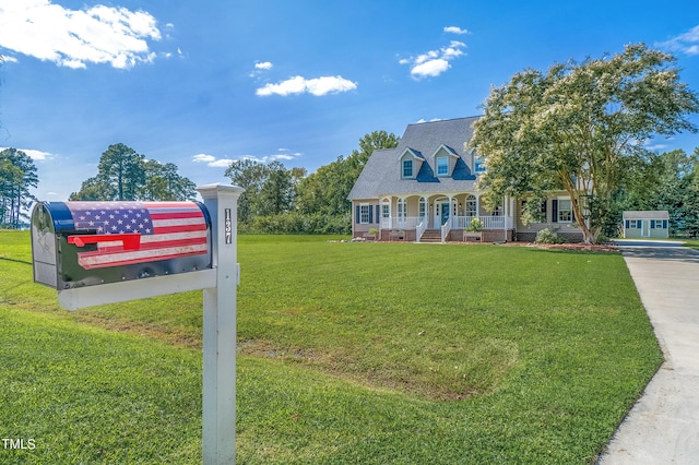 cape cod house featuring crawl space, covered porch, and a front lawn