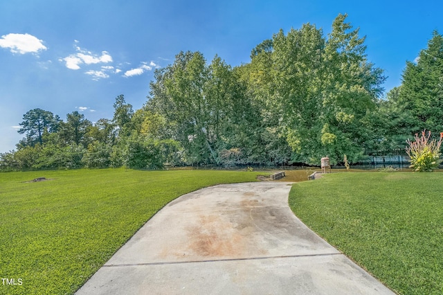 view of community with a lawn