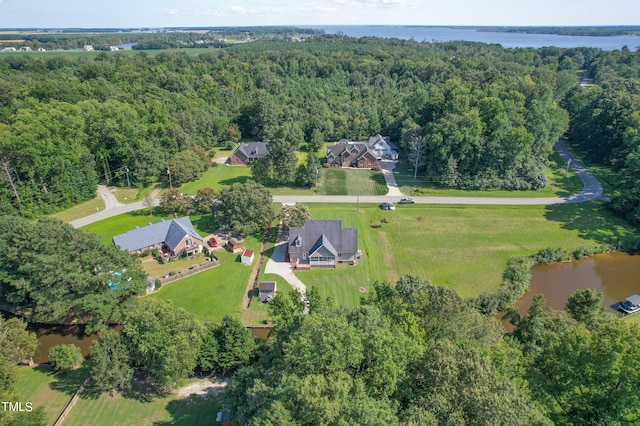 bird's eye view featuring a water view and a wooded view