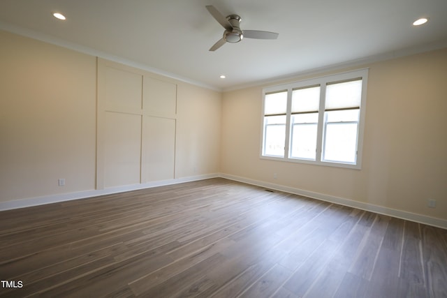 spare room featuring ceiling fan, crown molding, and hardwood / wood-style floors