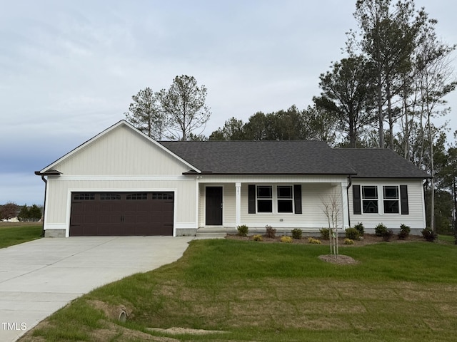 ranch-style house featuring a garage and a front yard