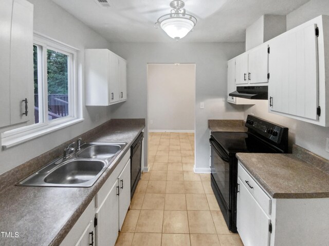 kitchen with sink, black appliances, white cabinetry, and light tile patterned flooring