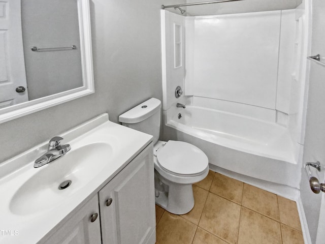 full bath featuring washtub / shower combination, vanity, toilet, and tile patterned floors