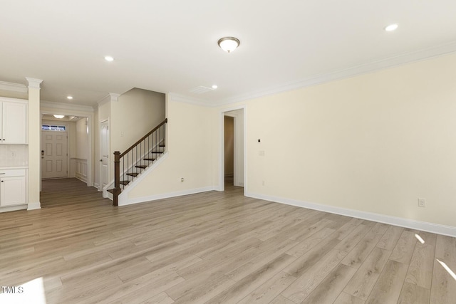 unfurnished living room with light hardwood / wood-style floors and crown molding