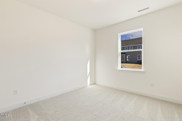 empty room featuring carpet floors