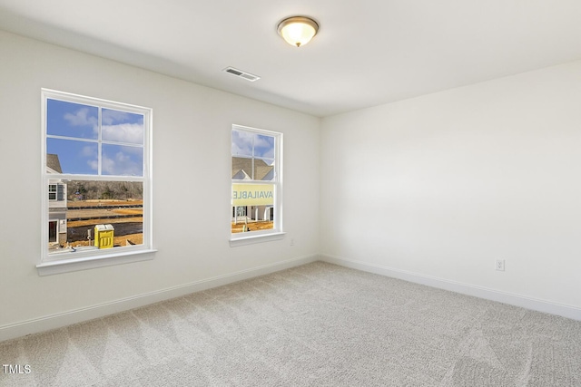 view of carpeted spare room