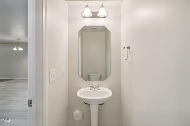 bathroom featuring hardwood / wood-style flooring