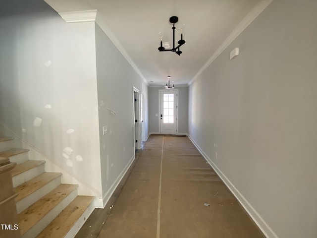 hallway featuring baseboards, stairway, an inviting chandelier, and crown molding