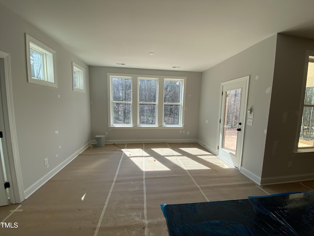 interior space featuring visible vents and baseboards