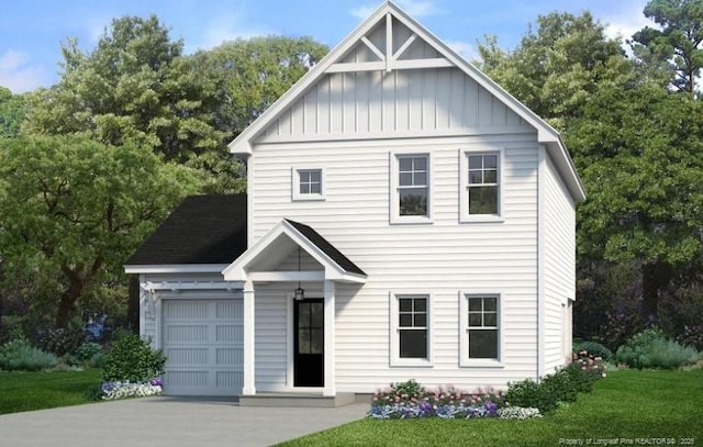 view of front of home featuring a garage and a front yard