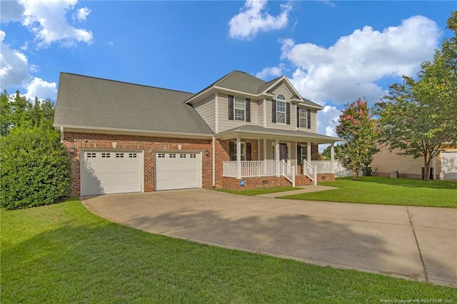 colonial home with concrete driveway, a porch, a front lawn, and brick siding